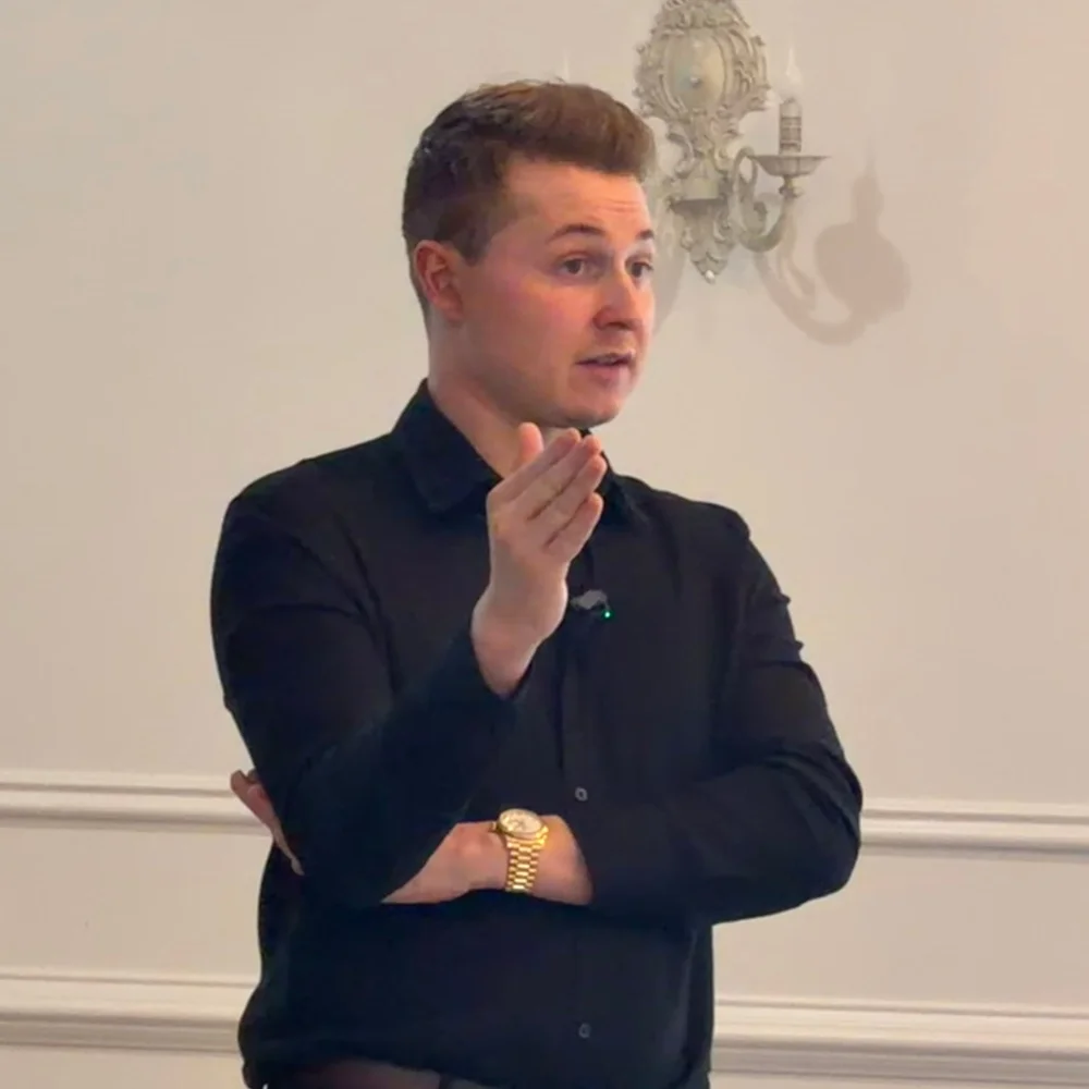 A USTI educator speaking to a class